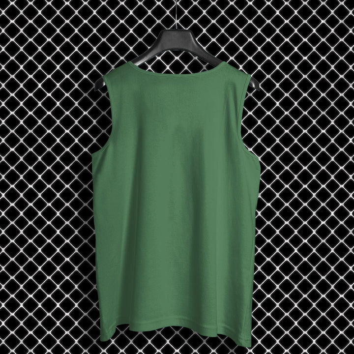 Green cotton sleeveless top for workout hanging on black hanger with chain link fence background